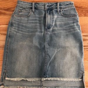 never worn light jean skirt, close to knee length